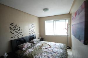 Postel nebo postele na pokoji v ubytování Appartement Panoramique