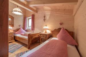 Postel nebo postele na pokoji v ubytování Ötztal Chalet