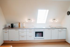 Kuchyňa alebo kuchynka v ubytovaní Ferienwohnung Perner - die Huabm