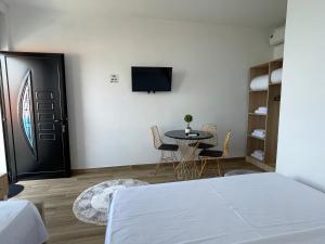 TV a/nebo společenská místnost v ubytování four generation hotel