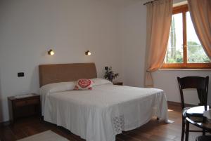 Postel nebo postele na pokoji v ubytování Vista Assisi