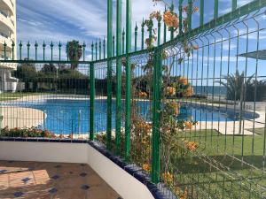 The swimming pool at or close to Lujo en banana beach primera línea de playa