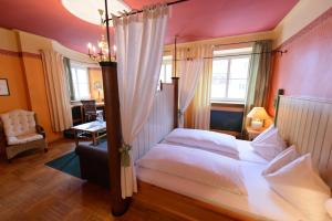 Lova arba lovos apgyvendinimo įstaigoje Gasthof Hotel Zweimüller