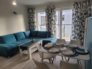 Posedenie v ubytovaní POBIEROWO BALTIC Apartament Turkusowy