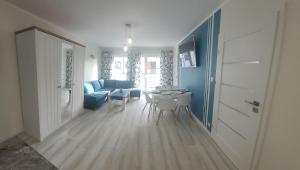 Posedenie v ubytovaní POBIEROWO BALTIC Apartament Turkusowy