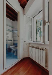 a bathroom with a sink and a toilet in it at PRIA de MAR in Riomaggiore