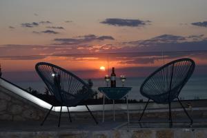 The sunrise or sunset as seen from A villát or nearby