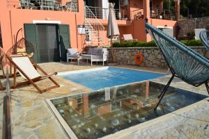 The swimming pool at or close to Villa Thetis with private pool where the sunsets fade away
