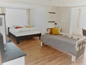 Ένα ή περισσότερα κρεβάτια σε δωμάτιο στο Resort LUFT Sněžník