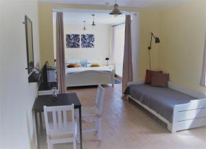 Ένα ή περισσότερα κρεβάτια σε δωμάτιο στο Resort LUFT Sněžník