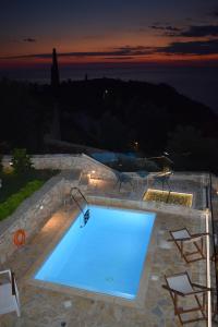 The swimming pool at or close to Villa Thetis with private pool where the sunsets fade away