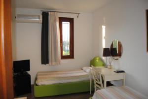 Ένα ή περισσότερα κρεβάτια σε δωμάτιο στο Case Giannone