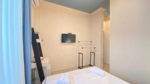Postel nebo postele na pokoji v ubytování Mose art Hotel