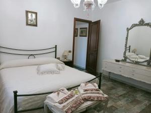 Posteľ alebo postele v izbe v ubytovaní Pirro & Sharon House