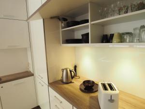 Kuchnia lub aneks kuchenny w obiekcie Grand-Tourist Apartments K2004 Simple Rest