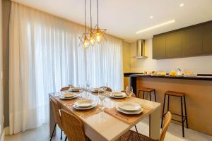 Foto sihtkohas Bombinhas asuva majutusasutuse Porto Madero - Amplo Apartamento em Condo com Piscina galeriist +21 fotot