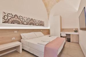 Postel nebo postele na pokoji v ubytování B&B Villa Gentile