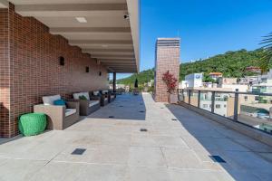 Rõdu või terrass majutusasutuses Porto Madero - Amplo Apartamento em Condo com Piscina