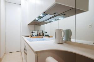 Kuchyňa alebo kuchynka v ubytovaní Acogedor Apartamento José Laguillo.