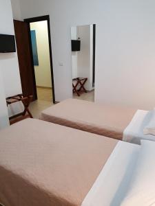Postel nebo postele na pokoji v ubytování Alba D'Amore Hotel & Spa