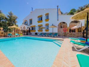 Bazén v ubytování Tu Villa Rural Lentisco 8 Dormitorios Piscina privada nebo v jeho okolí