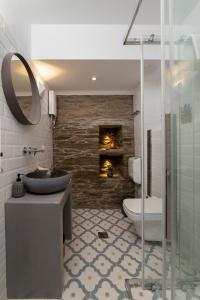 Koupelna v ubytování Korina's Suites