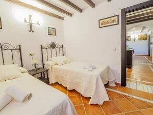 Postel nebo postele na pokoji v ubytování Tu Villa Rural Lentisco 8 Dormitorios Piscina privada