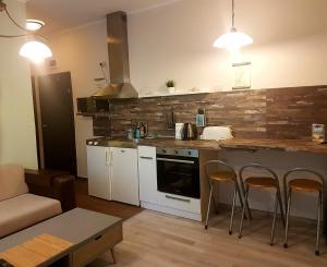 A kitchen or kitchenette at Aheloy Apartments