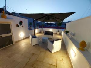 A balcony or terrace at Dimora Asmara 11 15
