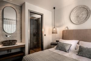 Postel nebo postele na pokoji v ubytování Cossoro Villas Zakynthos