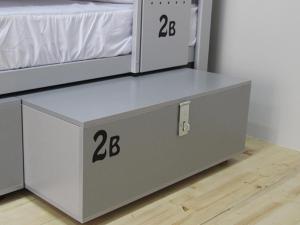 two beds with numbers on them in a room at BcnSportHostels in Barcelona