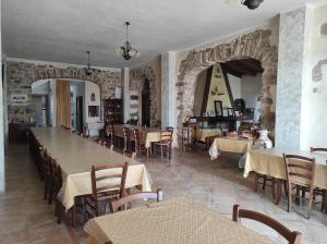 A restaurant or other place to eat at Agriturismo Gragonti, Arbus Costa Verde