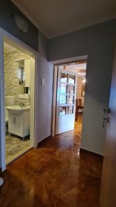 an empty room with a sink and a bathroom at Apartments Lara in Kotor