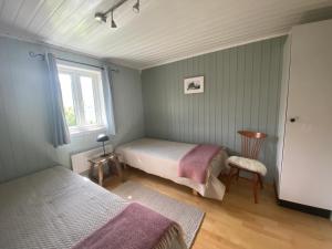 מיטה או מיטות בחדר ב-Wilderness House