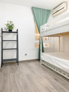Postel nebo postele na pokoji v ubytování MalagadeVacaciones - Maestranza 8