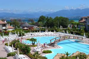 Bazén v ubytovaní Green Apartment and Pools alebo v jeho blízkosti