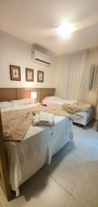 - une chambre avec 2 lits dans l'établissement Solar Água Pipa - Apto 115, à Pipa