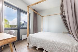 Katil atau katil-katil dalam bilik di Sea View 3 BDR Apt at Šventoji Port