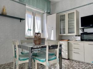 Kjøkken eller kjøkkenkrok på La Vue est Belle - Puglia Mia Apartments