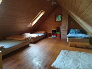 Postel nebo postele na pokoji v ubytování Chata Sport Vysočina