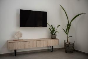 TV a/nebo společenská místnost v ubytování Cossoro Villas Zakynthos