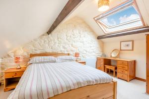 Katil atau katil-katil dalam bilik di Tryfan Cottage