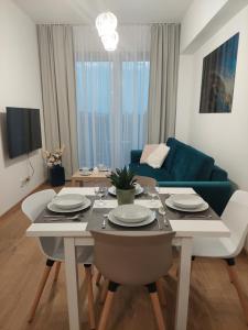 TV a/nebo společenská místnost v ubytování Apartamenty Vulcan