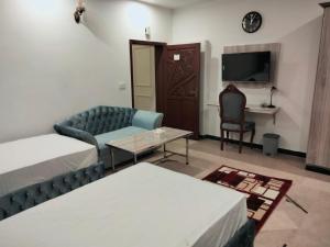 Oleskelutila majoituspaikassa Grand Swiss Hotel&Apartment Lahore