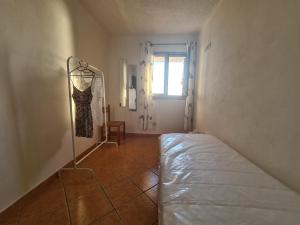 A bed or beds in a room at Filumare