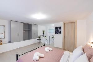 Posteľ alebo postele v izbe v ubytovaní Magdalenia's cozy apartments