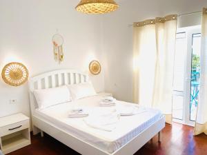 Postel nebo postele na pokoji v ubytování Las Nubes Rooms