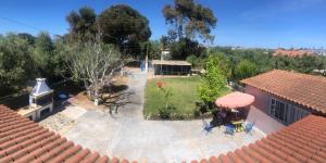 Fotografia z galérie ubytovania Malou Garden House Near The Beach v destinácii Glífa