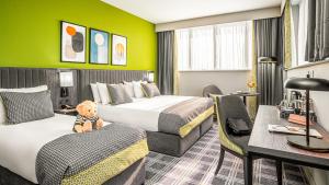 Postel nebo postele na pokoji v ubytování Plaza Hotel Tallaght