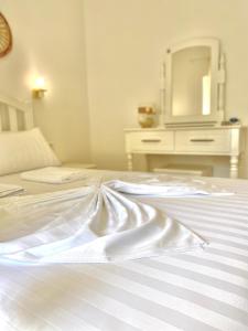 Postel nebo postele na pokoji v ubytování Las Nubes Rooms